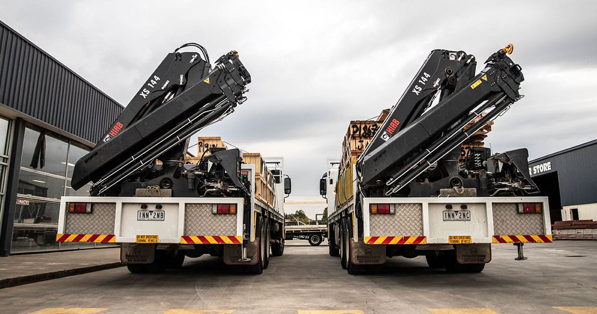 two-crane-trucks